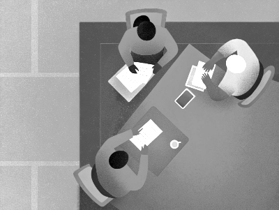 Colleagues collaborating on UX research in a conference room.